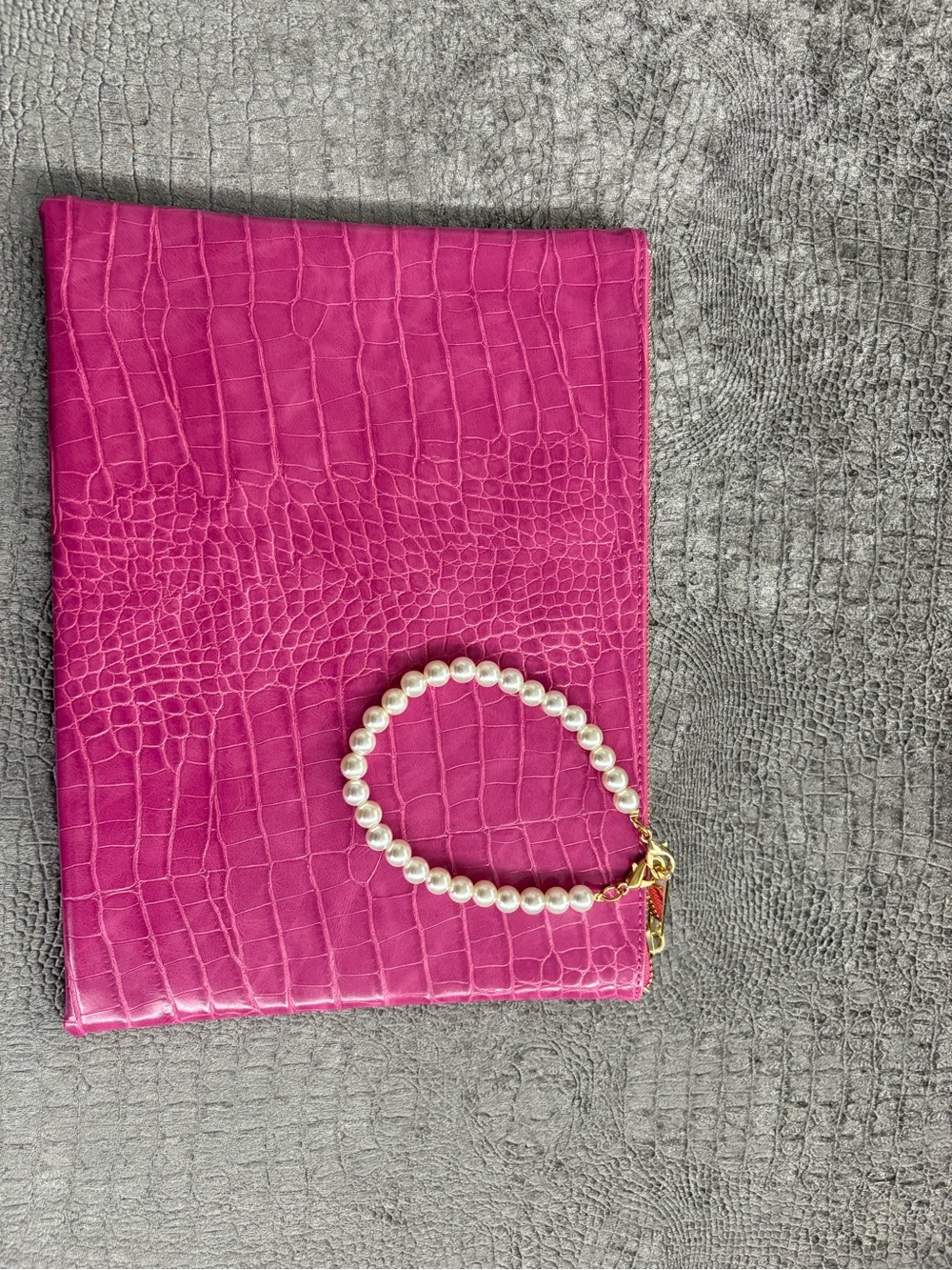 Pink Croc-Embossed Clutch with Pearl Strap